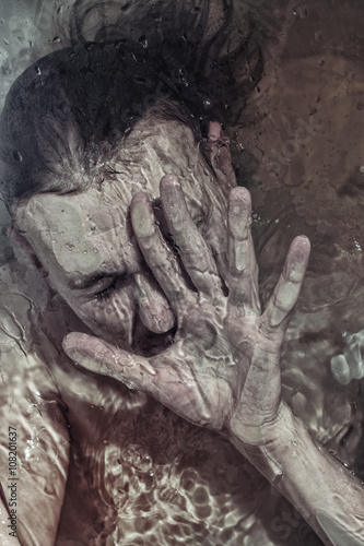 Portrait of a man drowning in the water © korionov