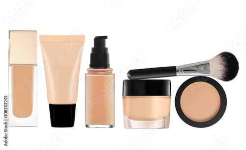 liquid makeup foundation in bottle and face powder isolated on w photo