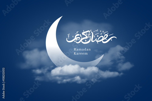 Billede på lærred Ramadan Kareem greeting with crescent moon and hand drawn calligraphy lettering which means ''Ramadan kareem'' on night cloudy background