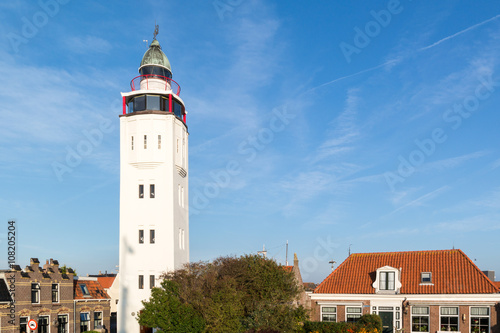 Former lighthouse now hotel in historic old town of Harlingen, Friesland, Netherlands