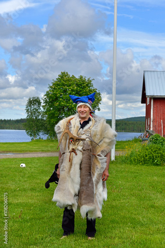 Sami shaman on field. Northern Finland, Lapland photo