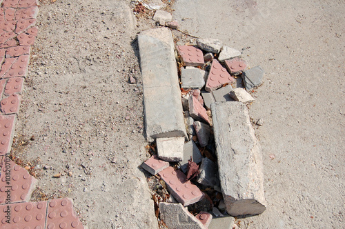 Broken sidewalk