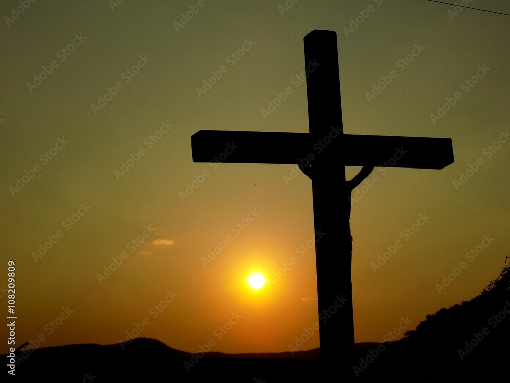 Cross with Jesus Christ and sunset Cross with Jesus Christ and sunset