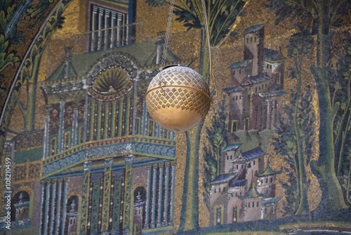 Suspended sphere in front of the mosaic background in the Omayyad mosque
