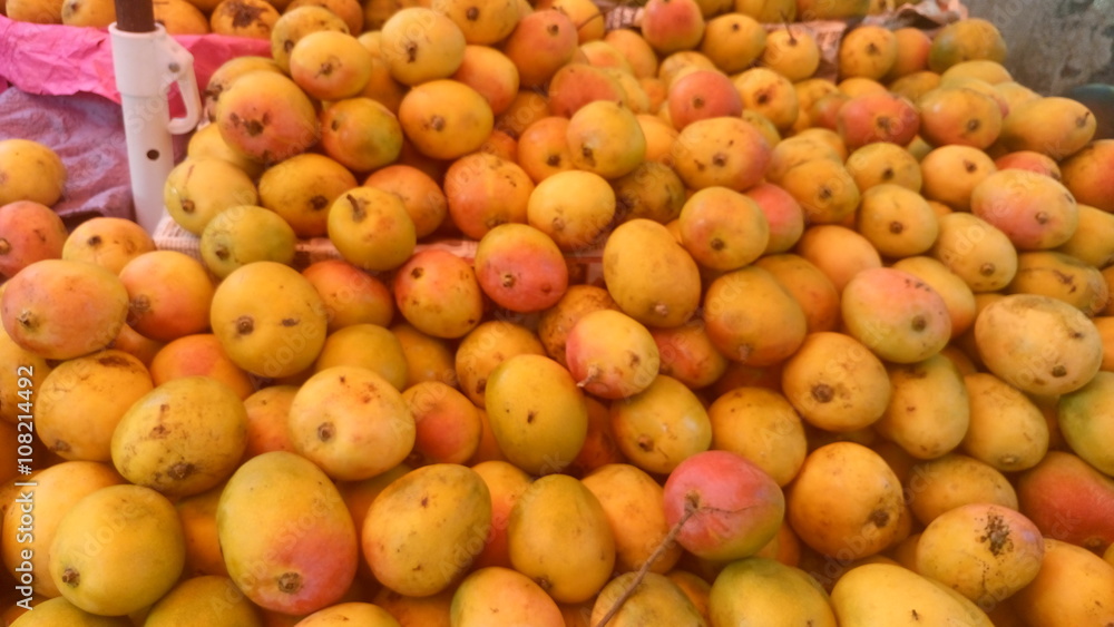 Full frame shot of mangoes for sale Full frame shot of mangoes for sale