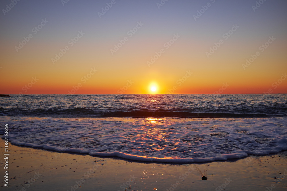 Nice sunset on the beach of the Black Sea