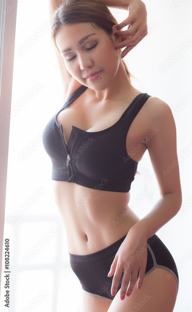 Fototapeta premium Sexy women with light afternoon side window.