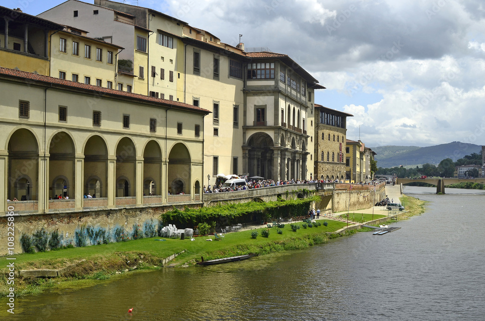 Florence, Italy, crowd of tourists in front of the entrance to Uffici along the river Arno