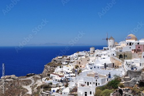 Santorini, one of the Cyclades islands in the Aegean Sea. The white houses of its 2 principal towns, Fira and Oia, cling to cliffs above an underwater caldera. They overlook the clear Aegean sea ...