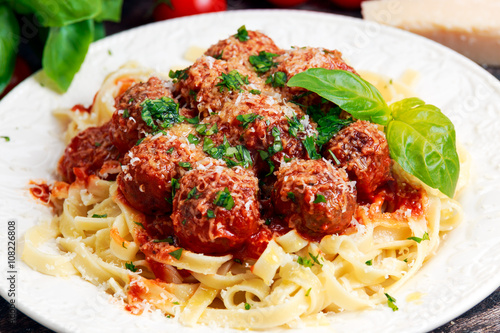 Italian Pasta spaghetti with meatballs in tomato sauce