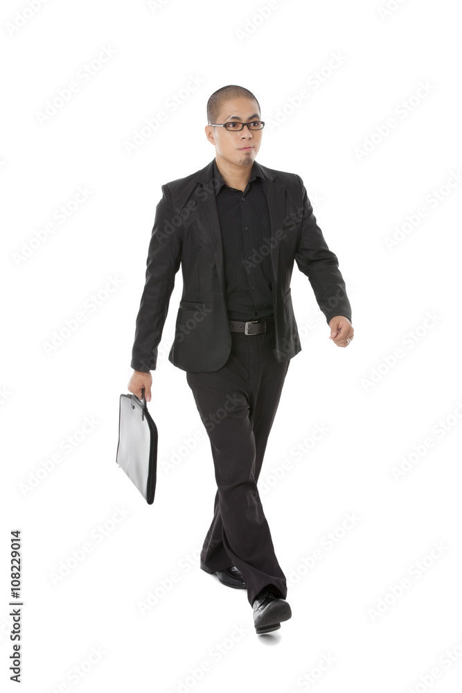 businessman walking with his attache case