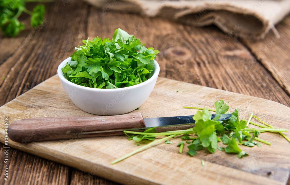 Parsley (on wooden background)