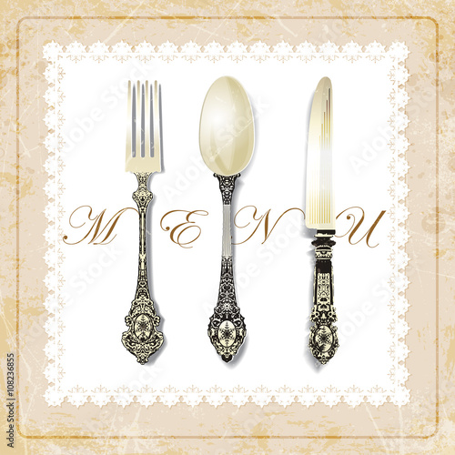 cutlery on grunge background. vintage spoon, fork, knife, napkin