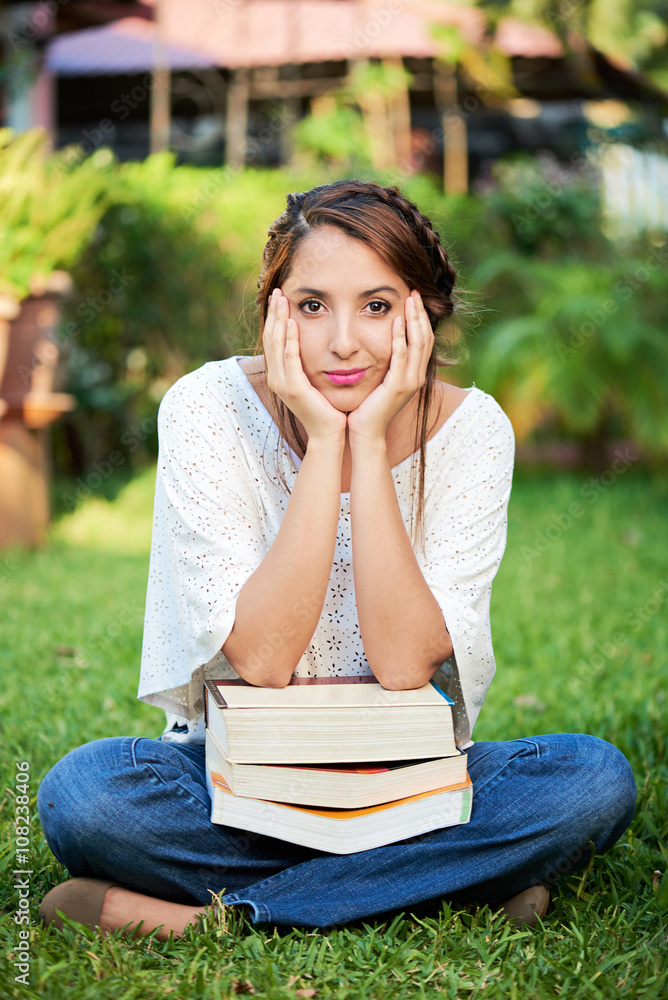 girl sit with books