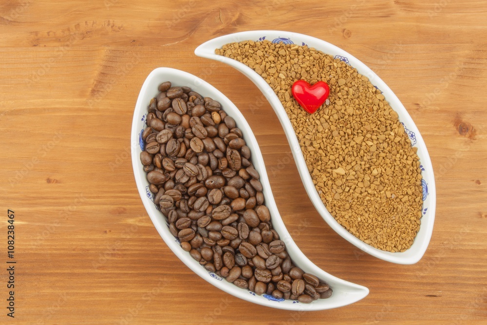 Natural coffee beans versus instant. Soluble and coffee beans on wooden background. Preparing fresh coffee. Sales of roasted coffee. Advertising for the sale of coffee.
Natural coffee beans versus instant. Soluble and coffee beans on wooden background. Preparing fresh coffee. Sales of roasted coffee. Advertising for the sale of coffee.