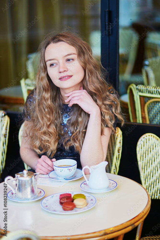 Beautiful Parisian woman in cafe