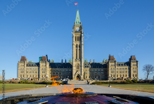 Parliament building in Ottawa, Canada - Centre Block, Peace Tower and Centennial Flame photo