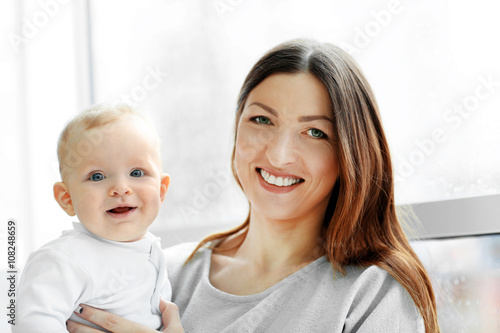 Beautiful woman with baby b...