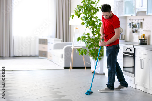 Wallpaper Mural Man cleaning floor indoors Torontodigital.ca