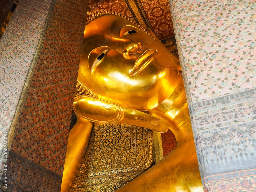 Golden Reclining Buddha Statue At Wat Pho, Bangkok, Thailand