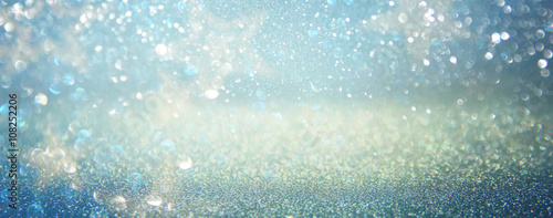 glitter vintage lights background. blue, silver. defocused