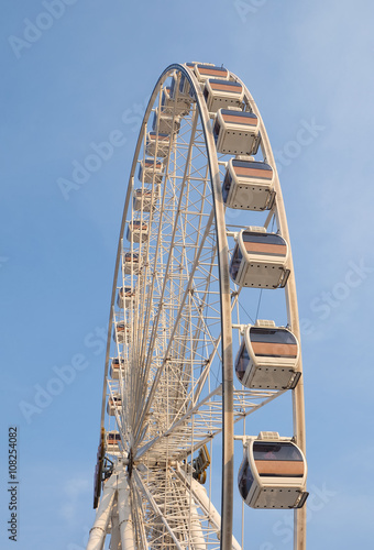Giant Ferris wheel with blue sky background © wiiin