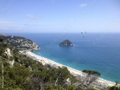 Paragliding near the isle of Bergeggi, in ligurian riviera