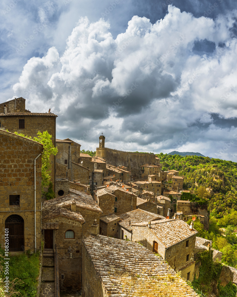 Old streets of greenery a medieval Tuscan town
