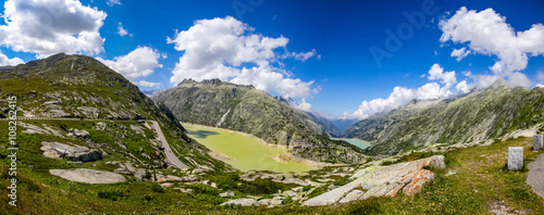 Grimselpass in Switzerland, with the road leading down to the la