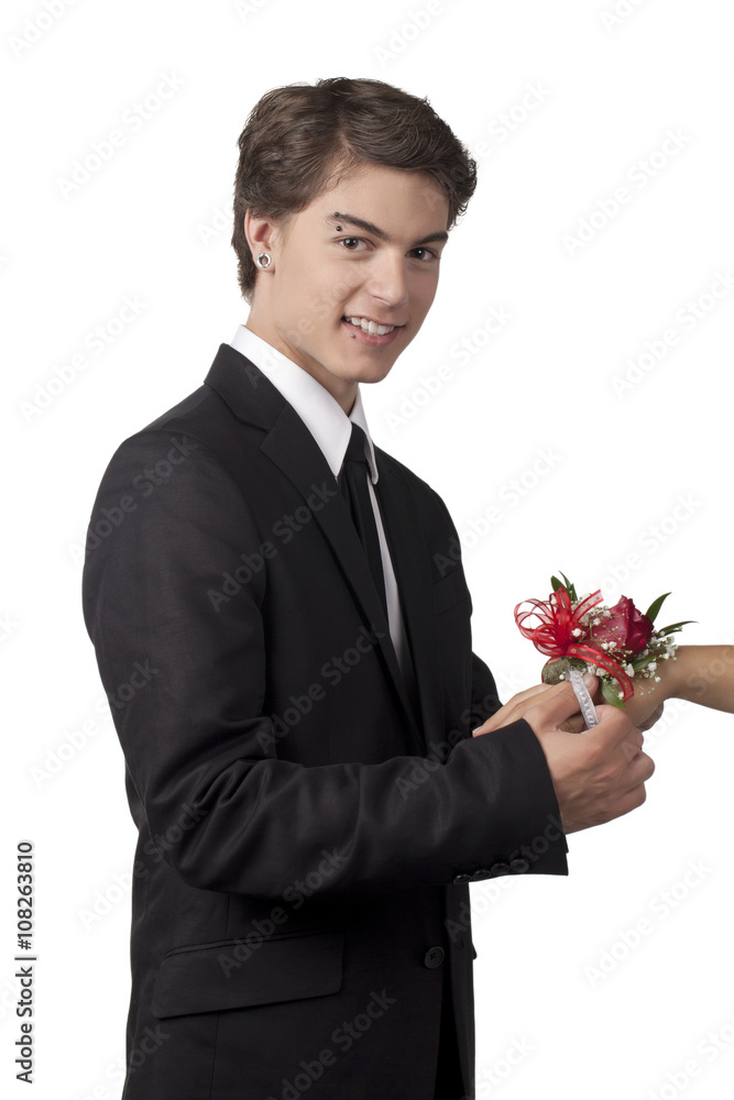 handsome man fixing flower bracelet on a human hand handsome man fixing flower bracelet on a human hand