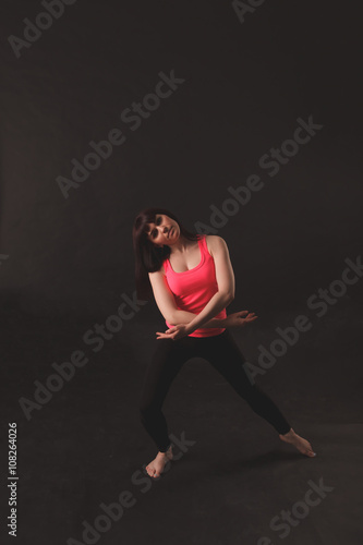 Portrait Of Young Beautiful Woman Dancing