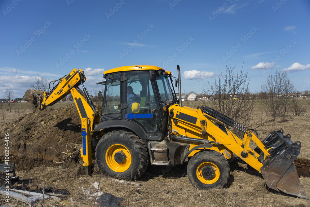 Tractor at a Construction Site and dirt lot. Tractor at a Construction Site and dirt lot.