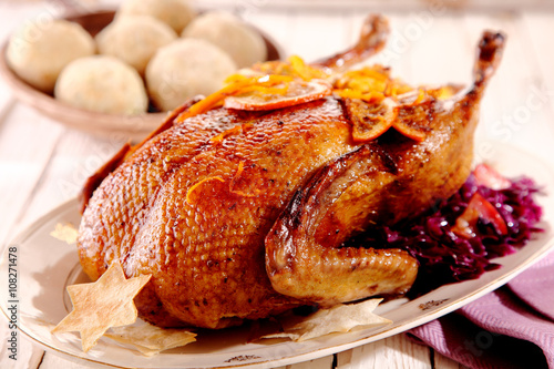 Single roasted chicken with star crackers photo