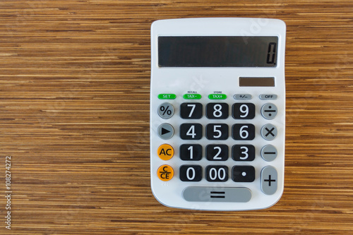 calculator on wood table