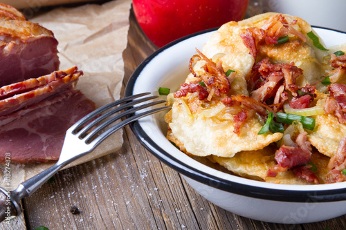Polish fried dumplings with meat, onion and bacon.