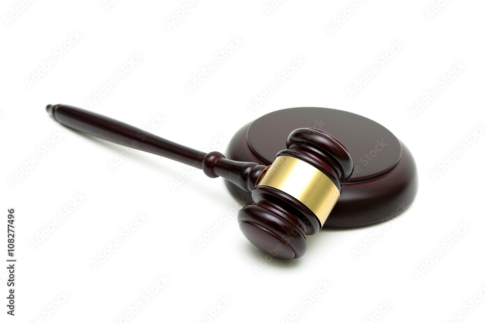 Judge gavel closeup on a white background.