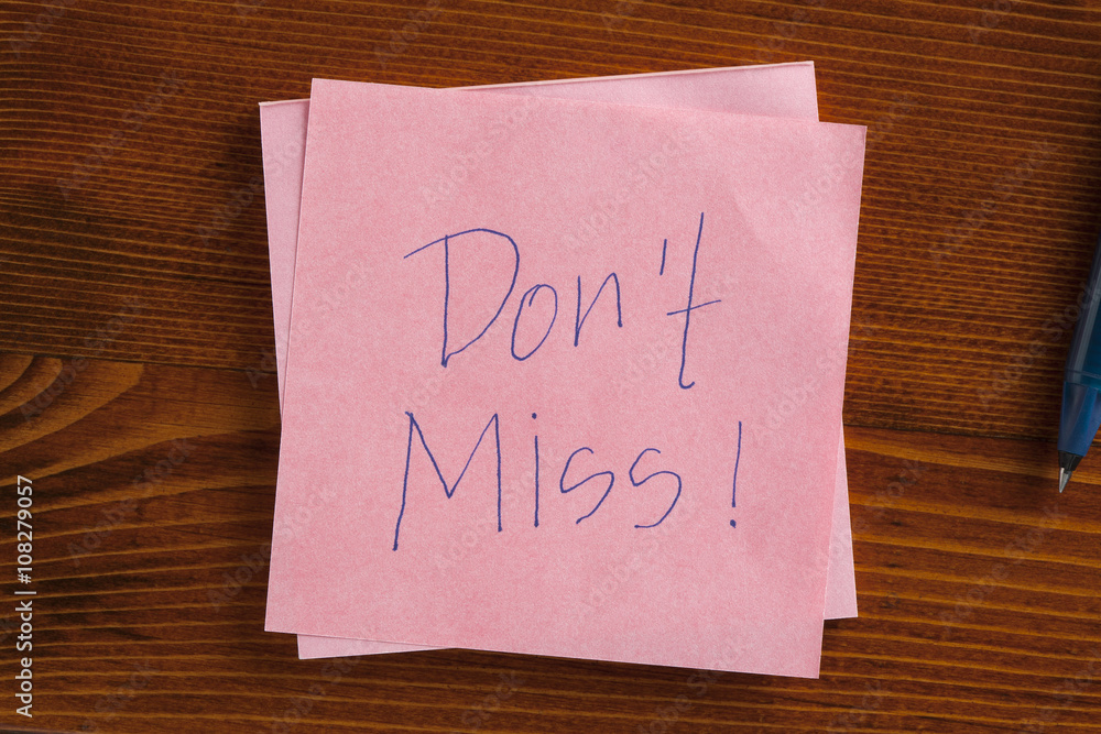 Don't miss written on a note Don't miss written on a note