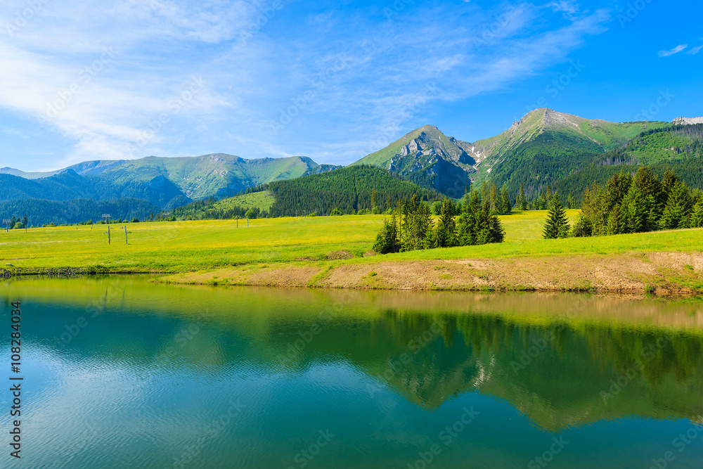 A view of beautiful lake in summer landscape of Tatra Mountains, Slovakia A view of beautiful lake in summer landscape of Tatra Mountains, Slovakia