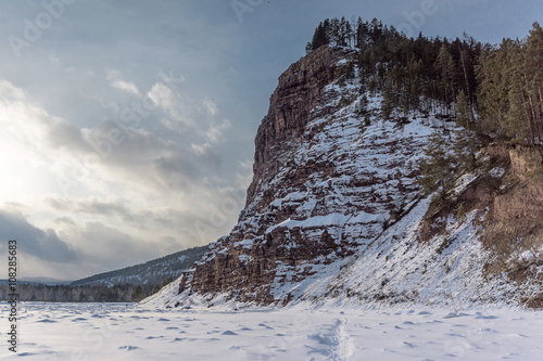 cliff towering above the river Irkut