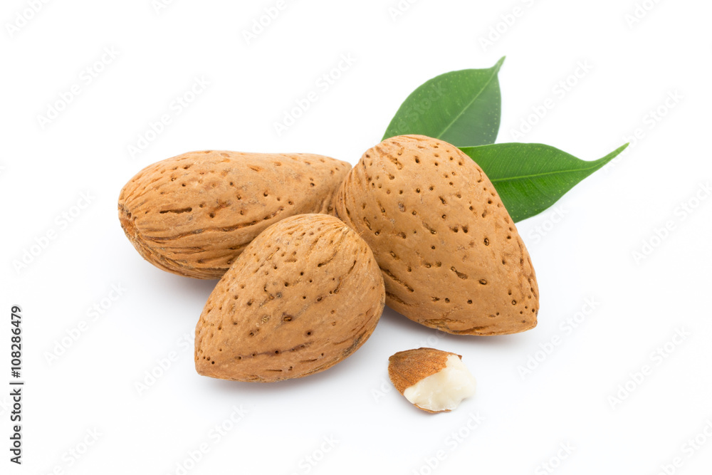 Almonds with leaves isolated on white background Almonds with leaves isolated on white background