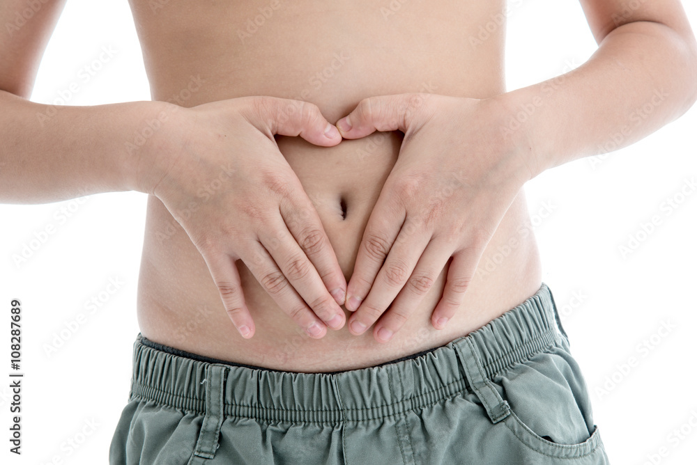 Fototapeta premium Boy's hands on stomach