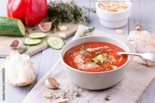 fresh tomato soup in a grey bowl