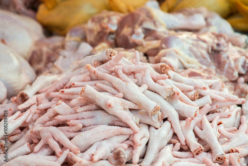 Chickens feet put it on the market for sale.