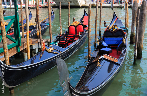 venetian gondolas in canal of Venice