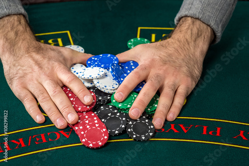 Poker play. Chips and cards