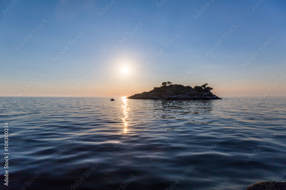 Sea sunset with island