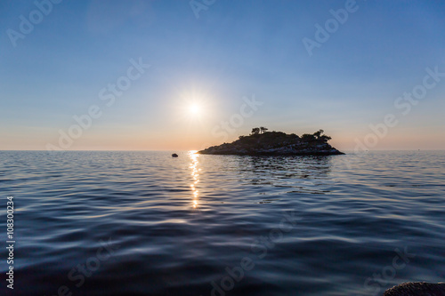 Sea sunset with island