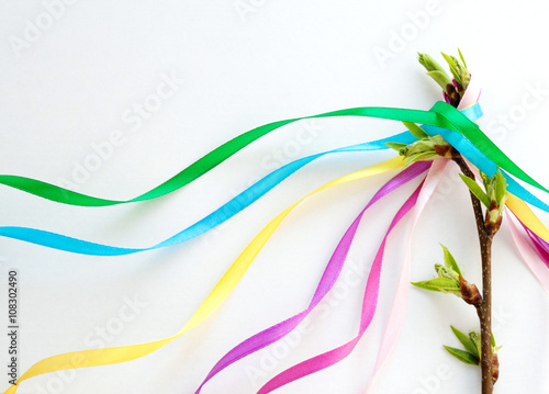 Maypole Day. May Day. Decoration with colored ribbons. Spring.