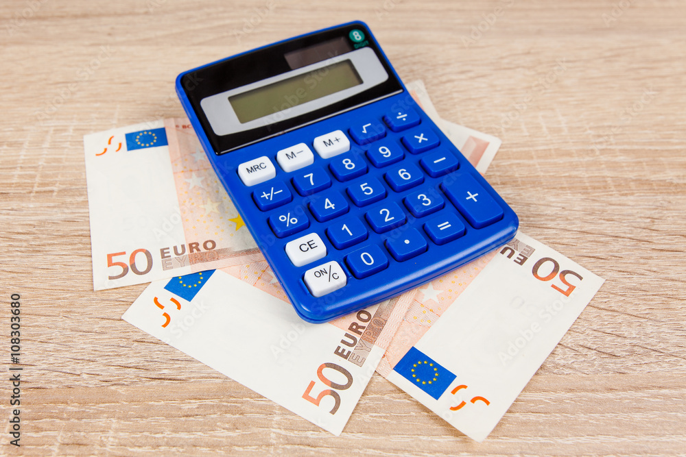 Financial concept. Euro money. Euro notes with calculator Financial concept. Euro money. Euro notes with calculator