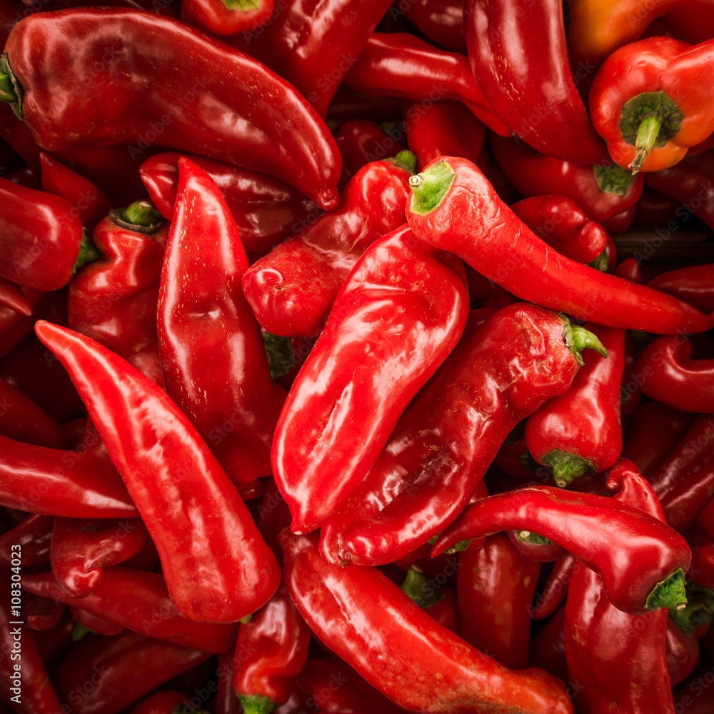 Red chili pepper background. many red peppers